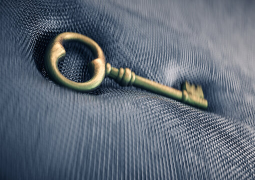 A golden old style key.