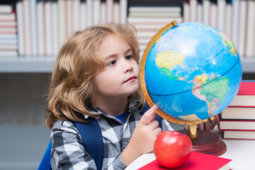 Smart caucasian school boy kid pupil student going back to school. Education kids.