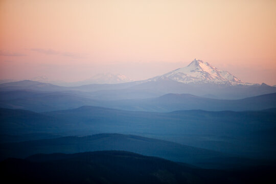 View Of Cascade Mountain Range Looking South From  Mt. Hood, Oregon, USA During A Summer Sunset.