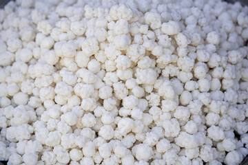 Heap of natural dana sugar-coated sweet food item 
