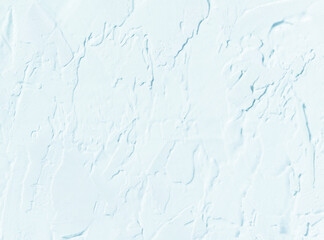 Acrylic and blue or off-white or blue paint on a wall with brush and palette knife strokes, hand drawing white or blue oil painting on the wall for art of decoration and design.	