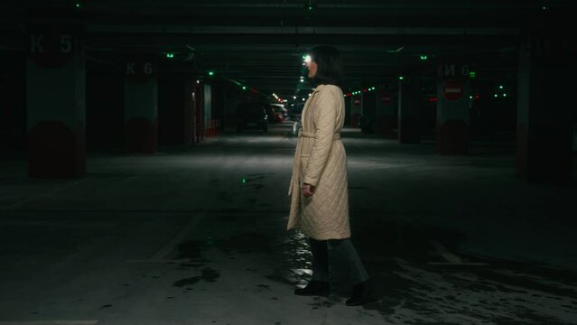 Full height woman waiting someone wait meeting taxi car order automobile walking from side to side looking around searching way stressed anxious worried female girl at parking lot lost search help