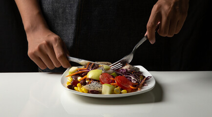 
 cooking vegetable salad ,vegetable salad top view mix fruit and  on white dish, Green vegan salad from green, 
Healthy clean eating layout vegetarian food, Fresh salad for breakfast