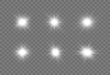 Set of bright white stars, flashes, lights, sparkles on transparent background. Horizontal lens flares pack. Christmas abstract pattern.