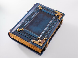 Vintage, medieval blue leather book with embossed frame and metal corners lay down isolated