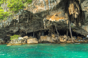 Bird's Nest Farm at Viking Cave in the emerald Andaman Sea of Krapi Province It is a cliff shelter in the southern corner of Koh Phi Phi Lay.
