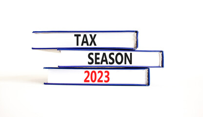 Tax season 2023 symbol. Concept words Tax season 2023 on books on a beautiful white table white background. Business Tax season 2023 concept. Copy space.