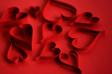 Valentine's Day. Postcard with a declaration of love. Valentine postcard. paper hearts on a red background