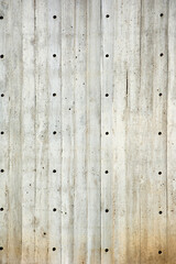 Cement woodgrain wall with holes for texture or background