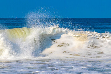Extremely huge big surfer waves at beach Puerto Escondido Mexico.