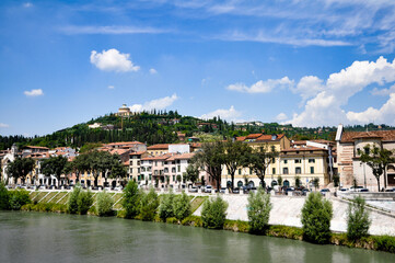 Fototapeta na wymiar view of the river and shore and hill in Verona