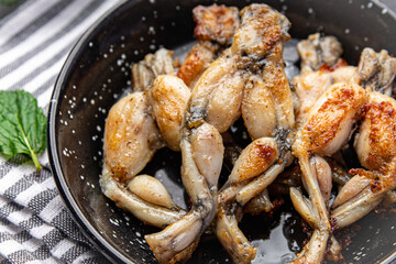 fried frog legs second course meat french food healthy meal food snack on the table copy space food background rustic top view