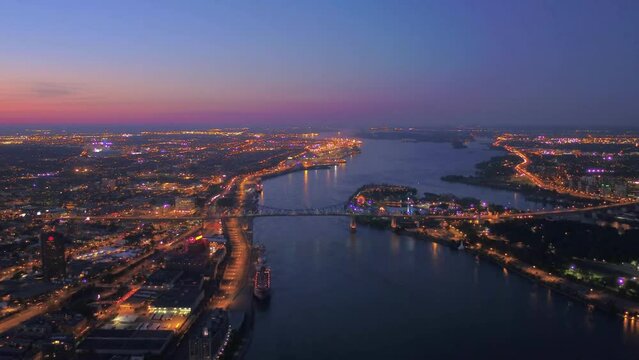 Montreal City Of Canada At Night With River, Aerial View 