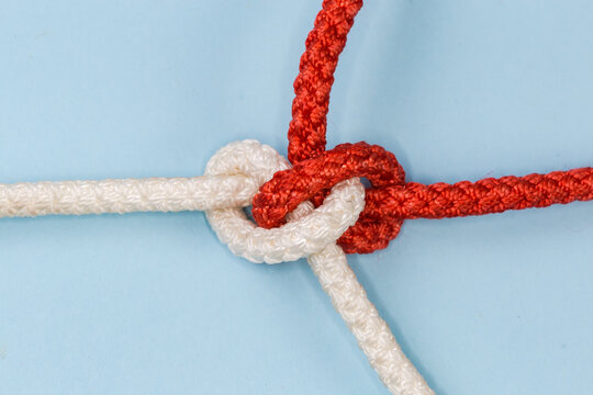 Rope Hunter knot on a blue background close-up