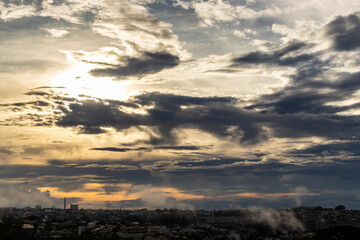 Dramatic sunset in the Sky through cumulus storm clouds, Timelapse. Awesome epic landscape. Amazing vibrant colors, in Brazil