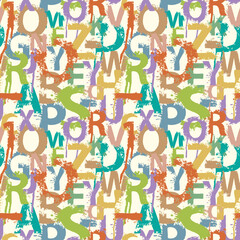 Seamless pattern with alphabet letters in form of colored paint splashes and blots. Abstract vector background with latin letters. Suitable for wallpaper, wrapping paper or fabric