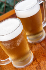 glass of beer on table