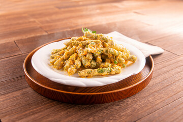 Golden Crispy Kidney Beans served dish isolated on wooden table top view of Hong Kong food