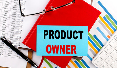 PRODUCT OWNER text on sticky on red notebook on chart background