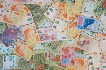Currency notes of Argentine peso cash.Economic,financial crisis in Argentina, economy, money, bank concept, background.