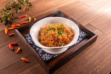 Spicy ants on the tree noodles served dish isolated on wooden table top view of Hong Kong food