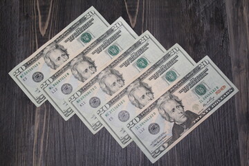 View of 5 $20.00 bills, total of $100,00 dollars. Twenty dollar bills.