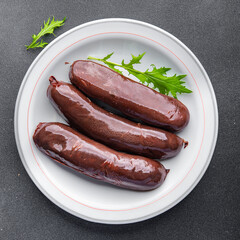 black pudding snack or bloody sausage fresh meal food on the table copy space food background...