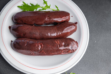 black pudding snack or bloody sausage fresh meal food on the table copy space food background...