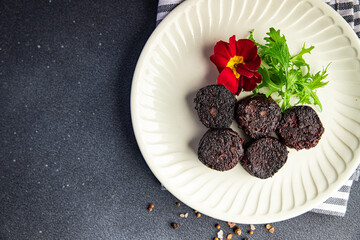 black pudding snack or bloody sausage fresh meal food on the table copy space food background...