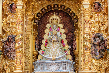 Fototapeta na wymiar Image of the Virgen del Rocio, inside of the Ermita del Rocío, hermitage in Almonte, in Huelva, Spain