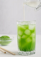 Preparation of organic natural antioxidant matcha drink made of ground powder of green tea leaves...