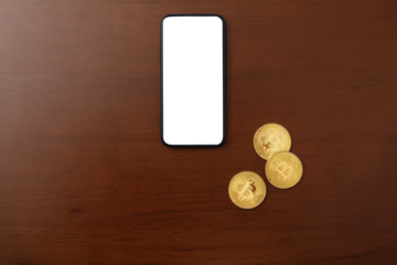 Mockup pay with bitcoin, woman with mobile phone and golden coin and bitcoin in hands