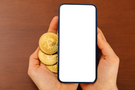 Mockup pay with bitcoin, woman with mobile phone and golden coin and bitcoin in hands