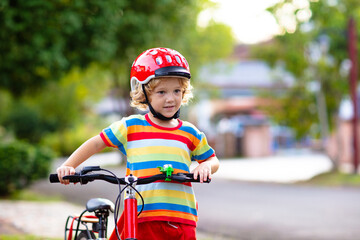 Kids on bike. Child on bicycle. Kid cycling.
