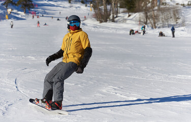 Dynamic shot with a snowboarder in action on the slope