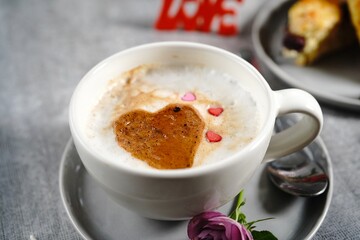 Valentines day breakfast Cappuccino heart  served with scones