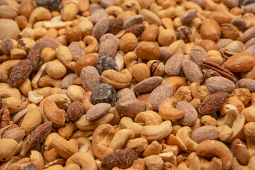 A group of almonds, pistachios, walnuts, macadamia, cashews.