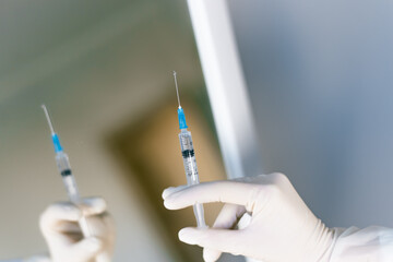 hand with syringe