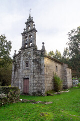 Fototapeta na wymiar View of the facade of the Romanesque church of San Martiño de Gargantáns (12th-13th centuries). Pontevedra, Spain.