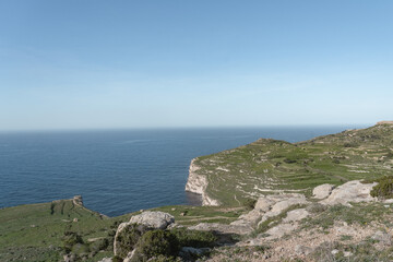 Fototapeta na wymiar Stunning green cliff view over the mediterranean sea in Malta