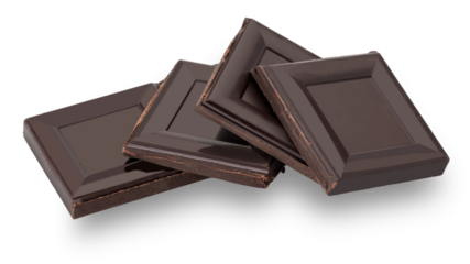 Square pieces of black chocolate bar stacked
