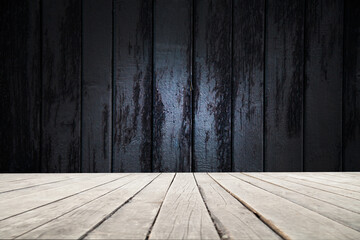 image of a wooden table on an abstract dark background with light in the center