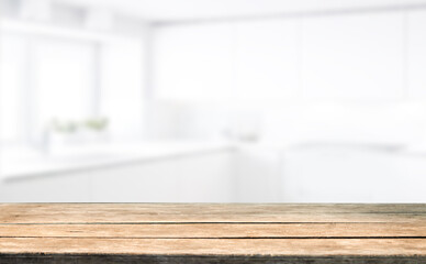 Wooden table top on blurred cafe showcase with light bulb. Background for product display montage or key visual design, abstraction