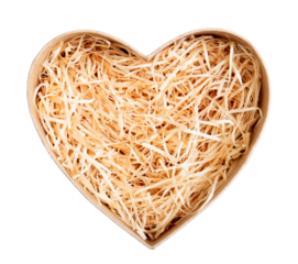 Top view of natural color open heart shape cardboard box with shredded wood excelsior for filling inside. Natural sustainable material for wrapping or products background. 