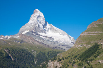 The Matterhorn peak over the Mattertal valley in Walliser aslps.