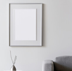 picture frame in white scandinavian room, with sofa and accessories (1)