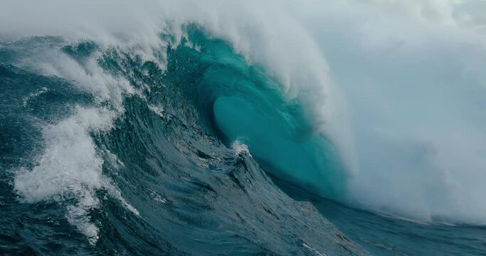 Large ocean wave breaking in slow motion, power of nature