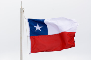 Naklejka na ściany i meble Bandera Chilena flameando al viento vista de cerca