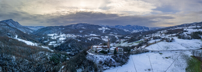 Drone view of Our Lady of Lourdes Grotto - Sperongia Parish - Morfasso, Piacenza, Emilia Romagna, Italy in winter