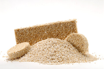 amount of amaranth, amaranth candy, typical mexican sweet alegrías, white background with space...